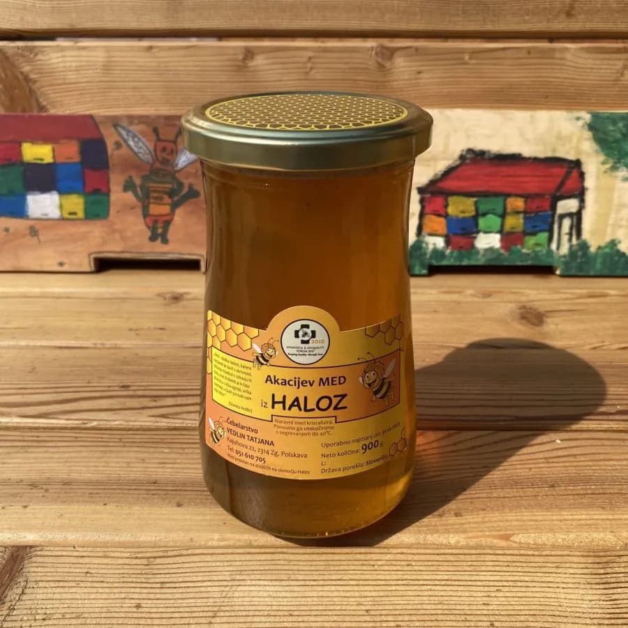 Kozarec bledo zlatega akacijevega medu